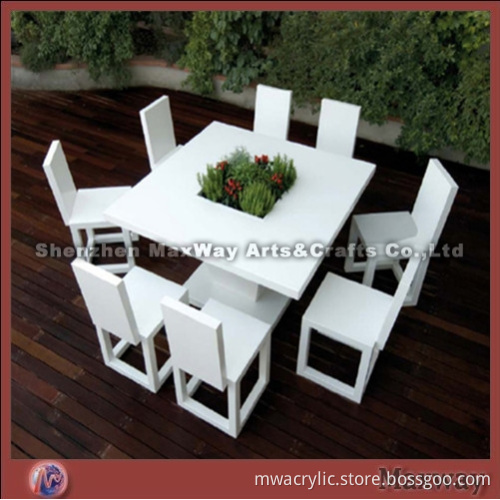 White quadrate acrylic furniture table with a lattice